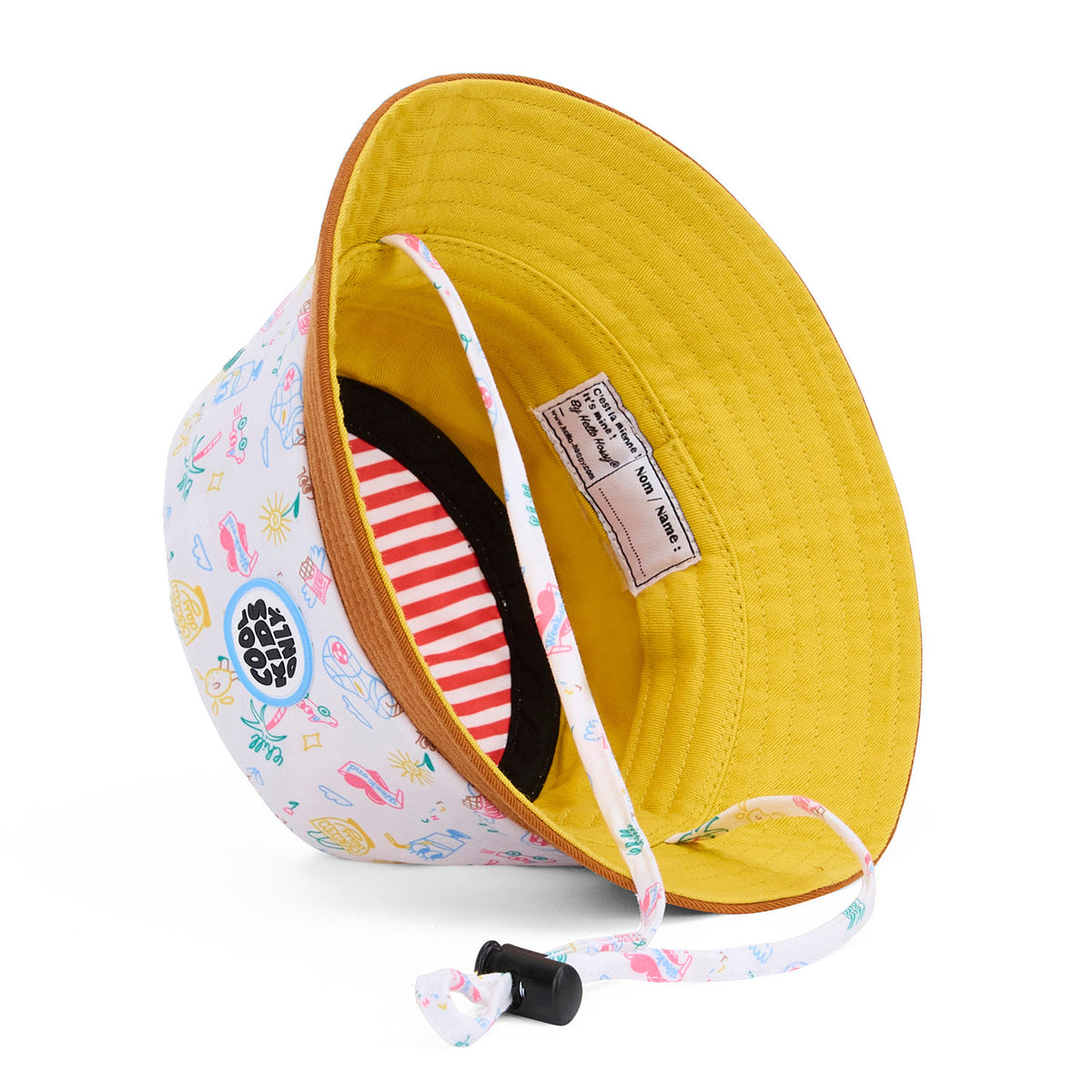 Gorrito infantil blanco con motivo de viajes e interior amarillo Hello Hossy