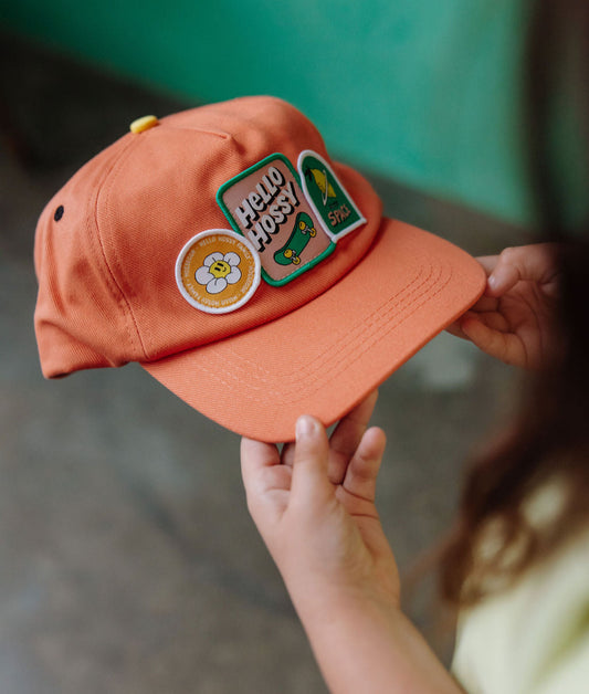 Casquette enfant orange patch skate visière courbée Hello Hossy