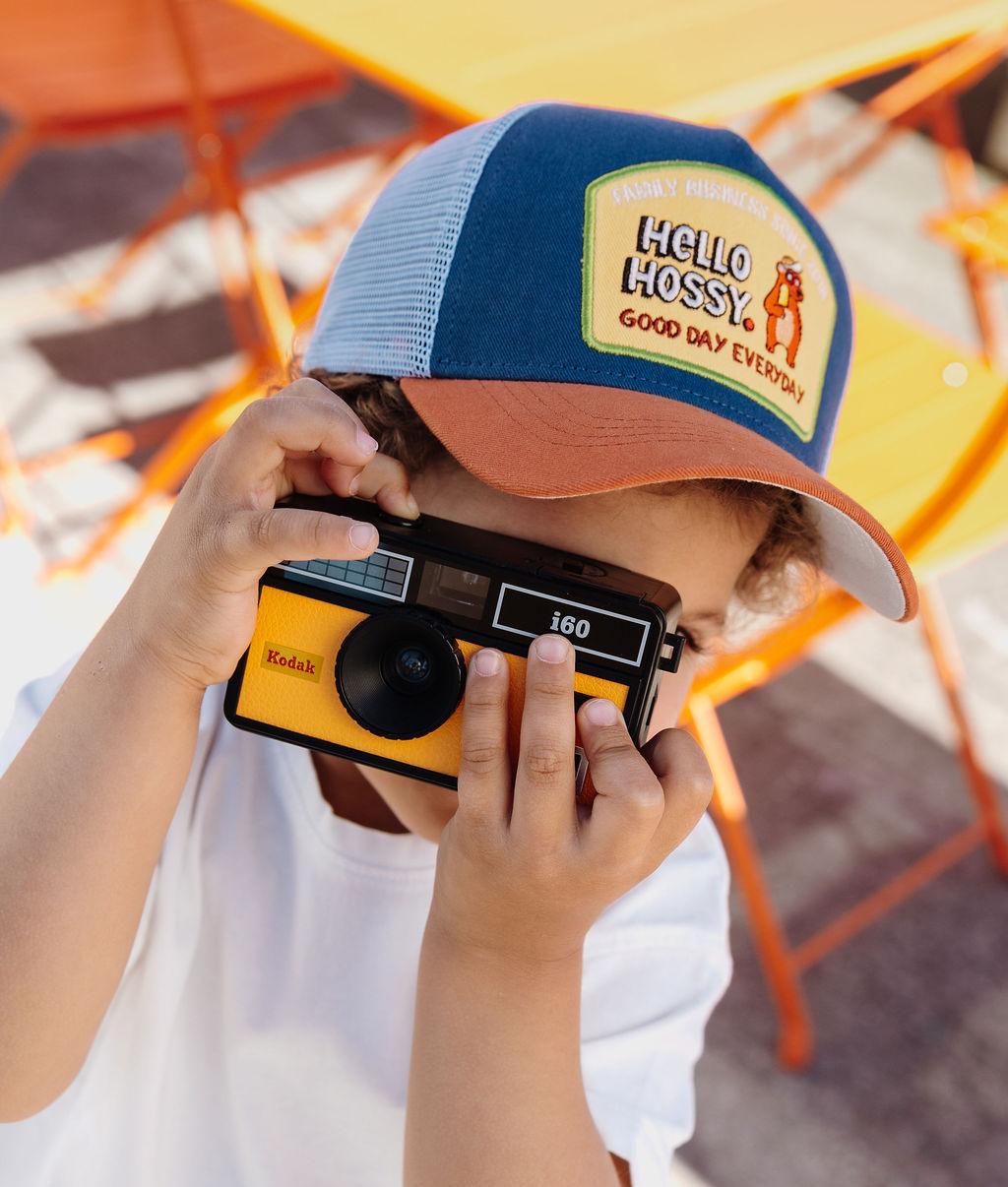 Gorra infantil azul blanco visera naranja Patch Hello Hossy