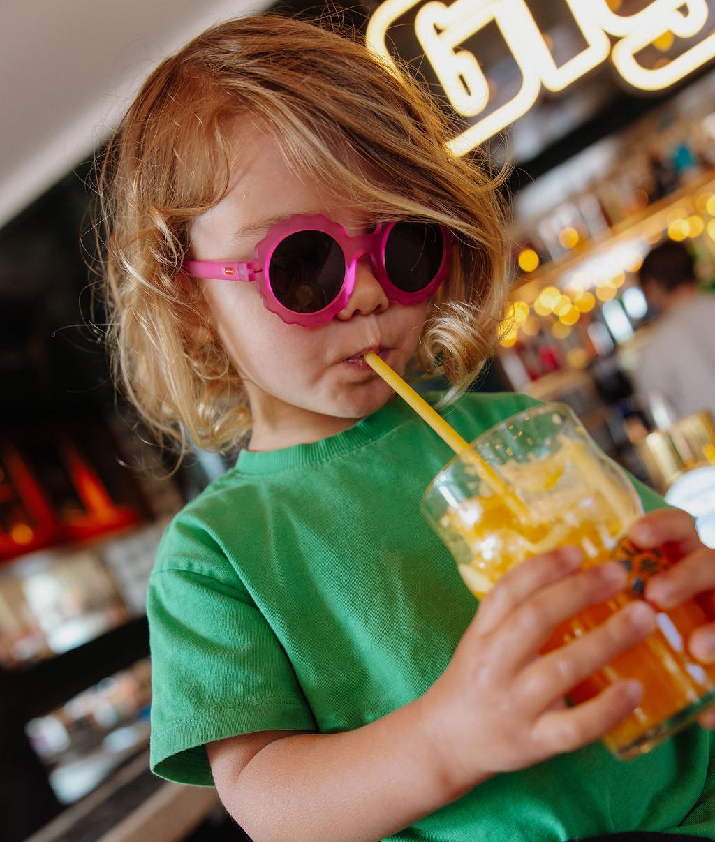 Lunettes de soleil enfant fuchsia forme fleur verres foncés Hello Hossy