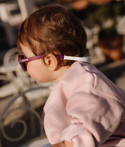 Gafas de sol niño violeta forma redonda con cierre trasero Hello Hossy