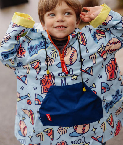 Poncho impermeable infantil azul claro con estampado de baseball y bolsillo delantero azul Hello Hossy