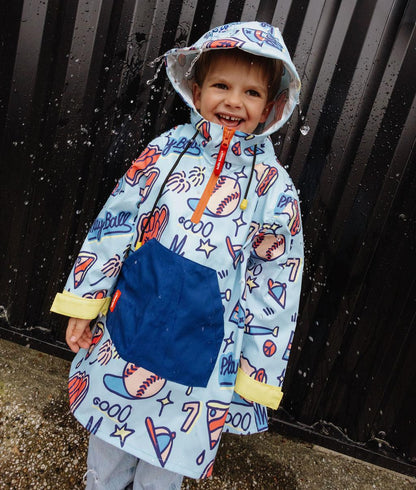 Poncho impermeable infantil azul con motivo de deporte y gran bolsillo frontal Hello Hossy