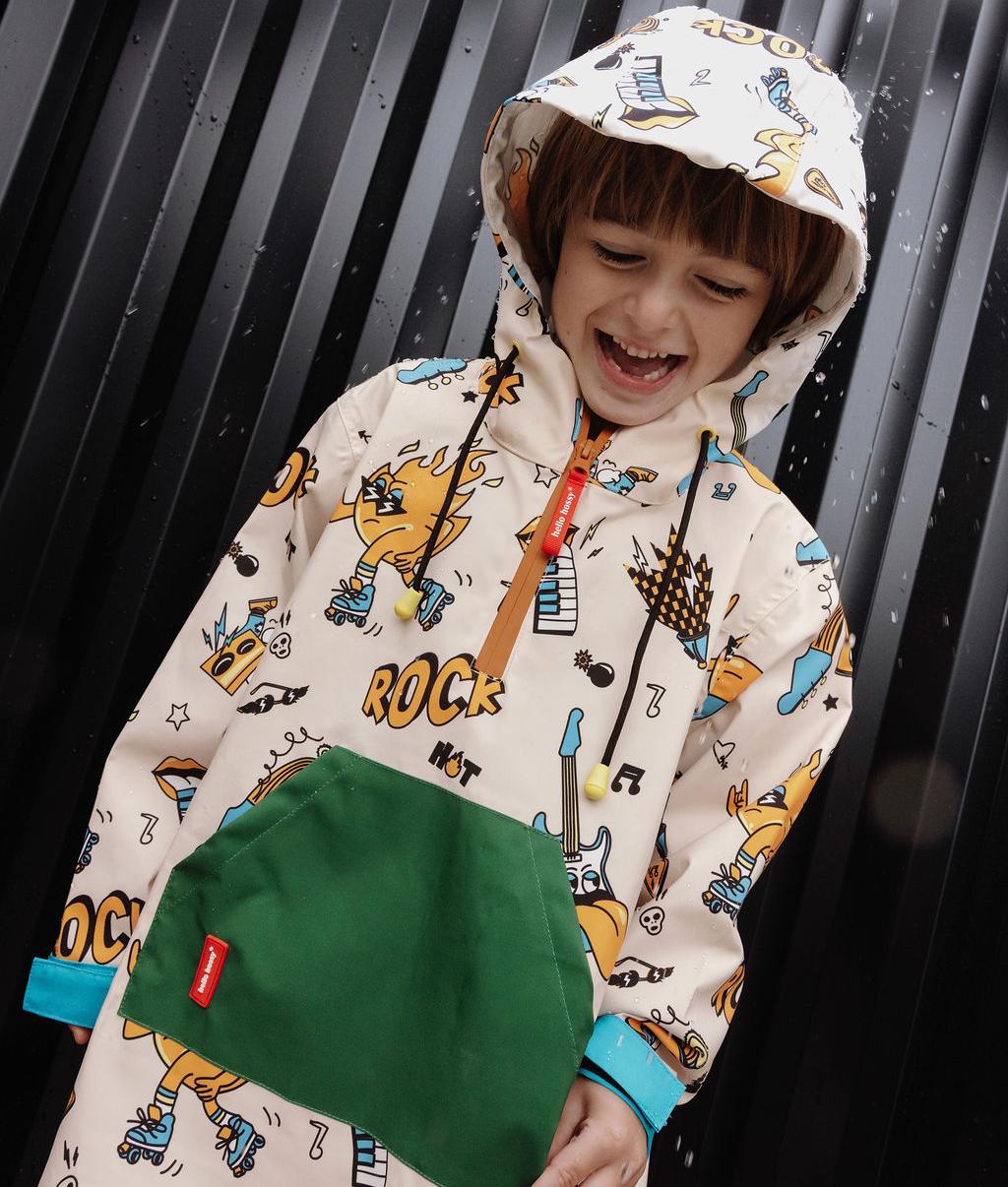 Poncho impermeable infantil crema estampado de música con bolsillo verde y capucha Hello Hossy