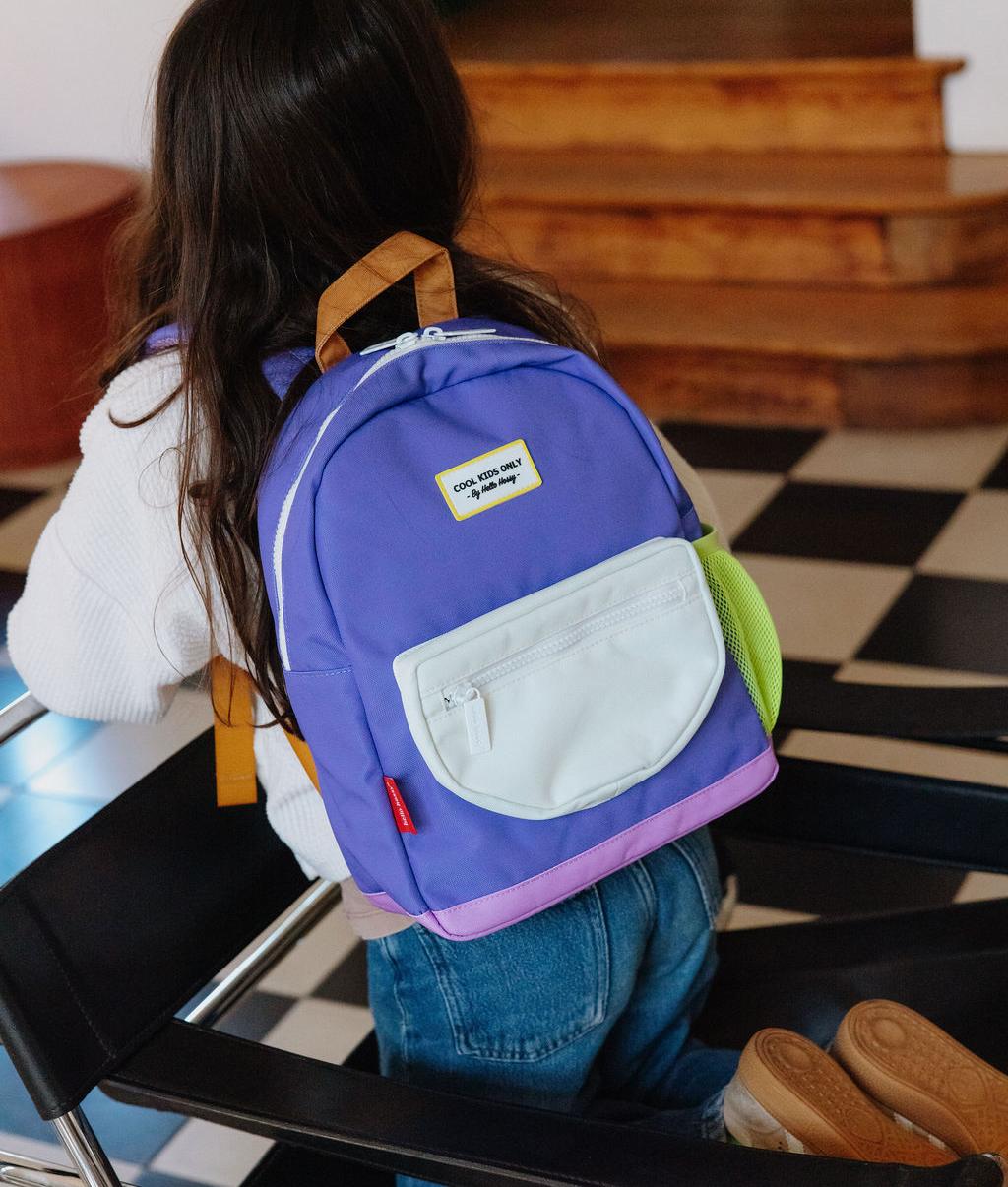 Mochila infantil violeta bolsillo blanco Hello Hossy