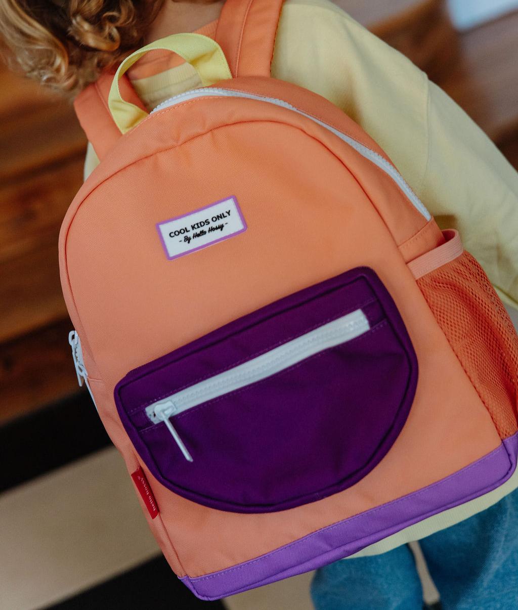 Mochila infantil naranja bolsillo violeta Hello Hossy