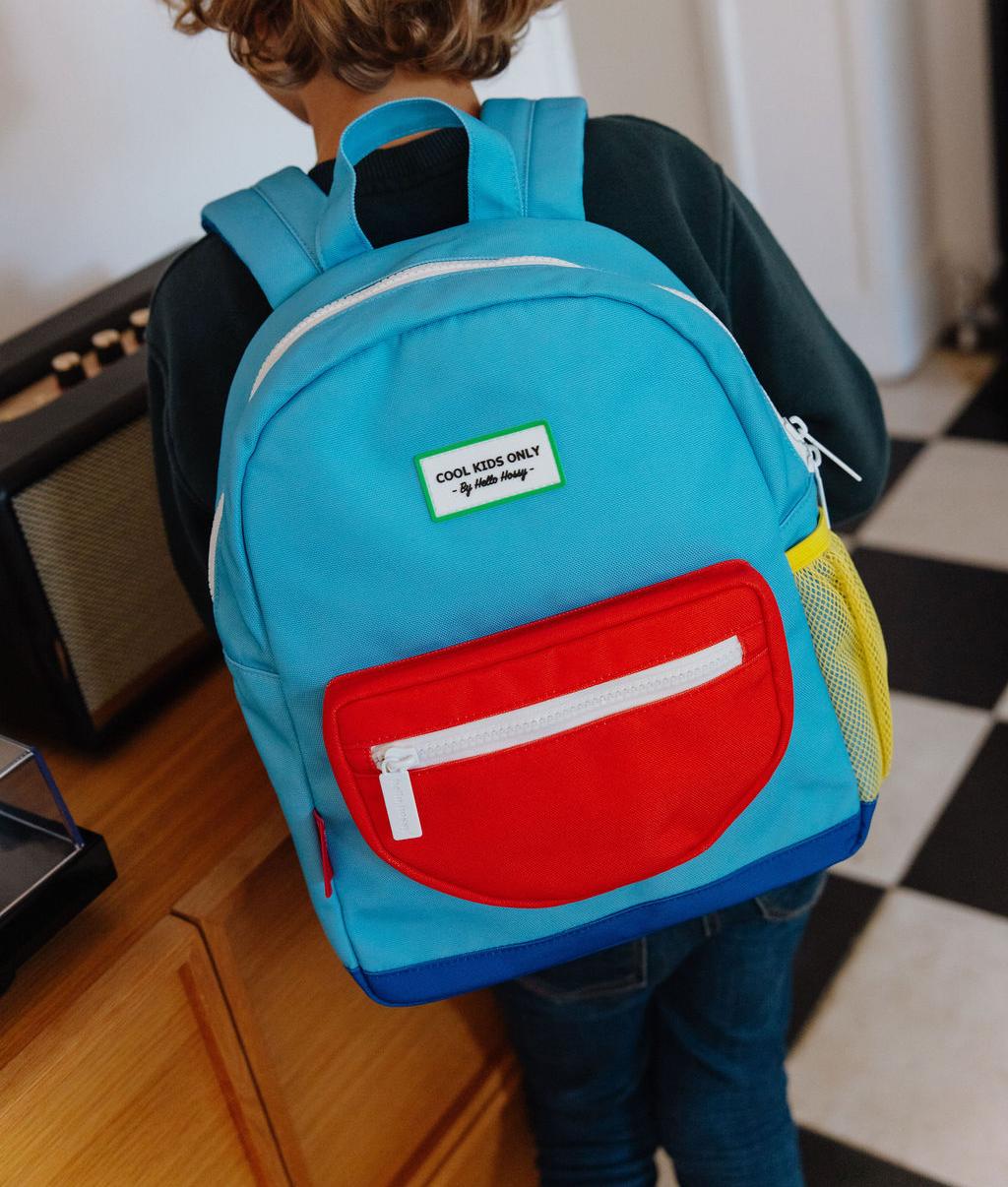Mochila infantil azul bolsillo rojo Hello Hossy