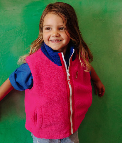 Chaleco polar infantil fucsia con cuello azul y bolsillos con cremallera Hello Hossy