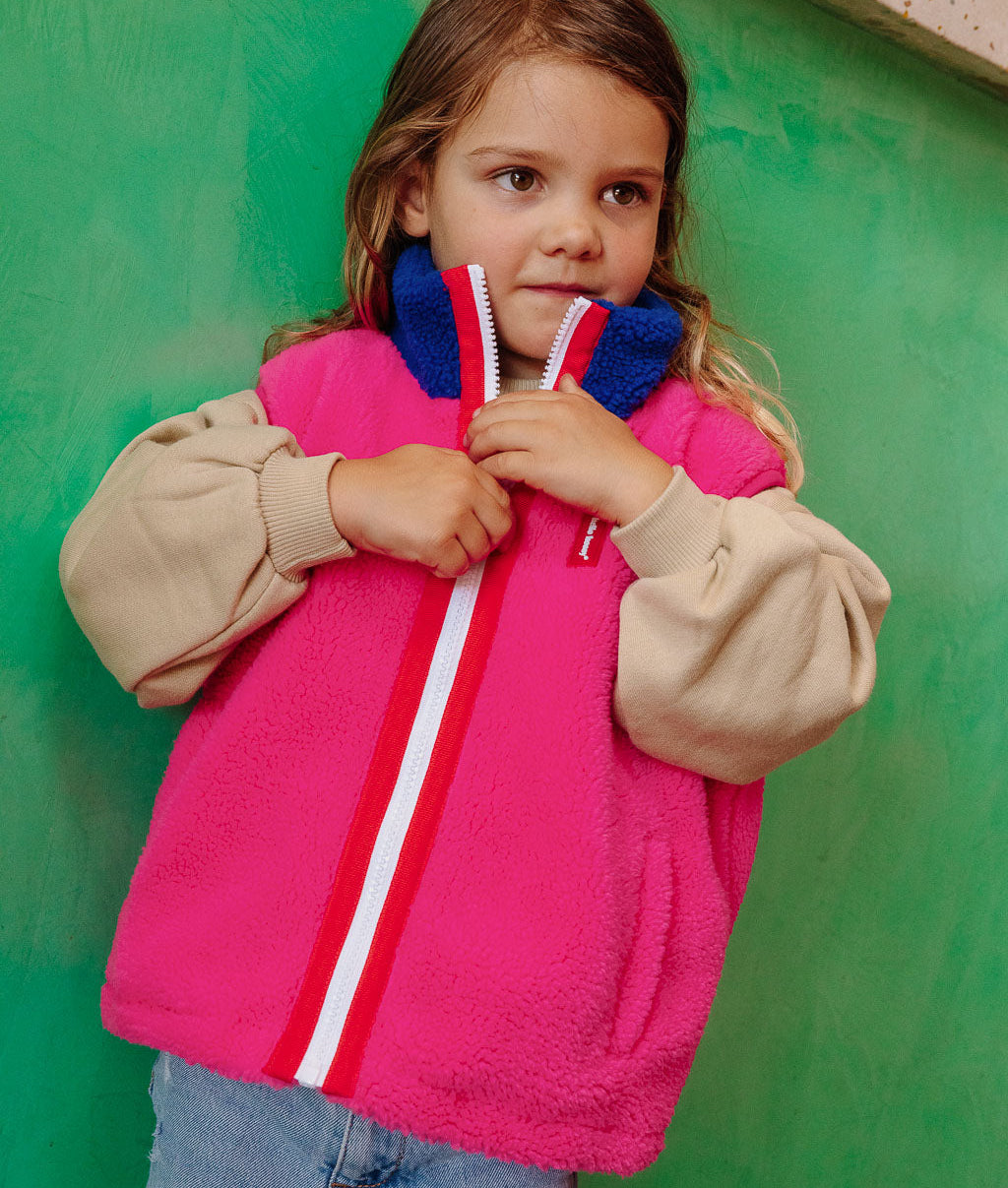 Chaleco polar infantil fucsia con cuello azul y cierre de cremallera Hello Hossy
