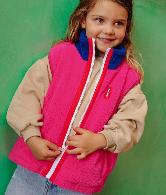 Chaleco polar infantil fucsia con cuello azul y abertura de cremallera Hello Hossy